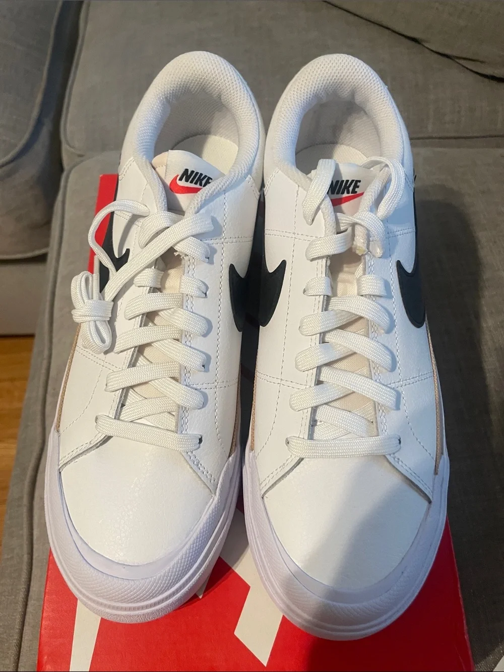 Nike womens White Low-Top Sneakers with Black Swoosh and Tan Accent - Picture 3 of 4